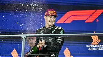 Russell wins Singapore GP as McLaren seal constructors' title Russell wins Singapore GP as McLaren seal constructors' title