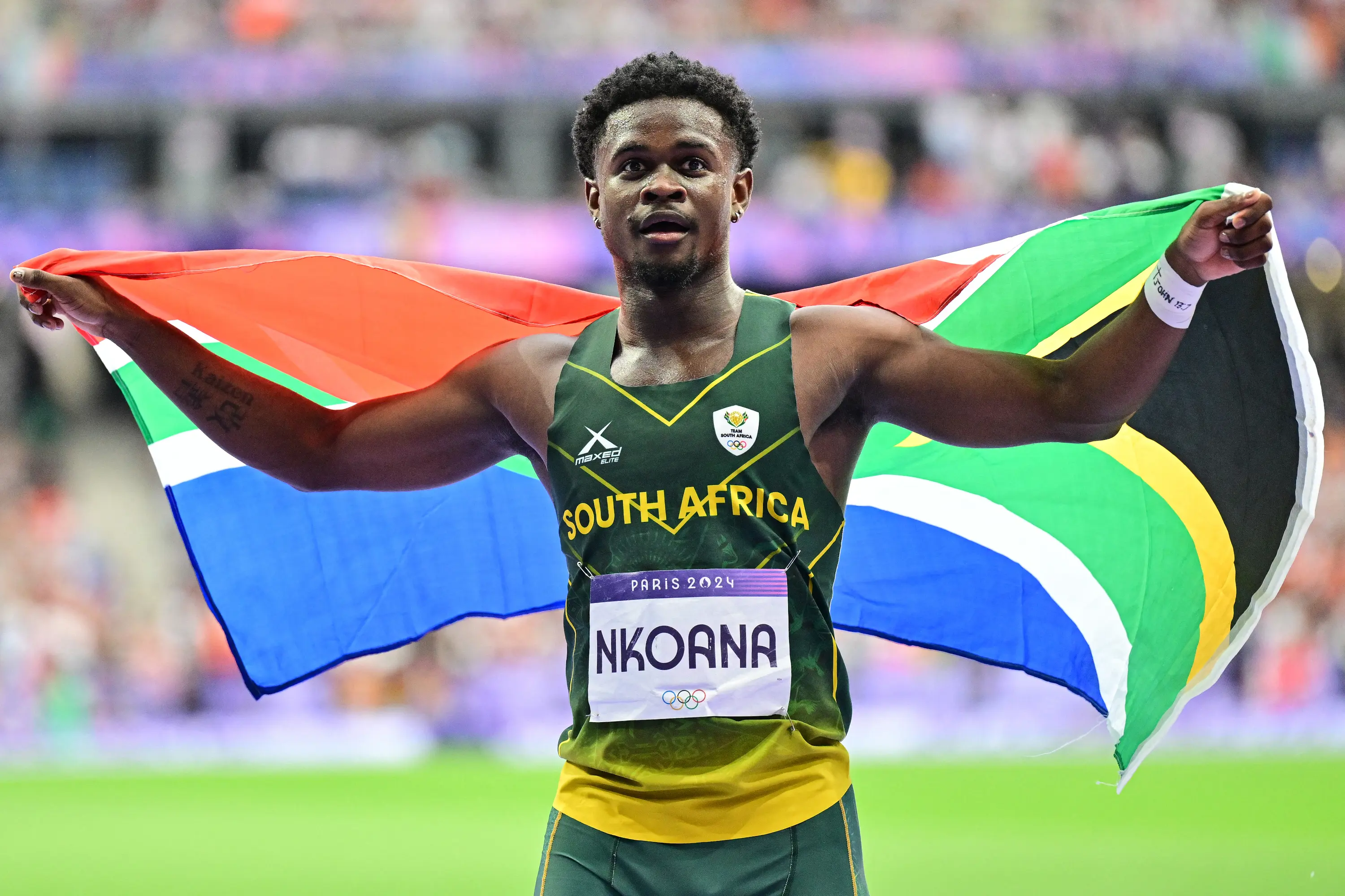 South Africa's Bradley Nkoana celebrates after competing in the men's 4x100m relay final of the athletics event at the Paris 2024 Olympic Games at Stade de France in Saint-Denis, north of Paris, on 9 August 2024. Picture: Martin BERNETTI / AFP South Africa's Bradley Nkoana celebrates after competing in the men's 4x100m relay final of the athletics event at the Paris 2024 Olympic Games at Stade de France in Saint-Denis, north of Paris, on 9 August 2024. Picture: Martin BERNETTI / AFP