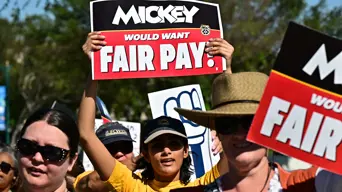 Disneyland workers threaten strike action over wages, treatment Disneyland workers threaten strike action over wages, treatment