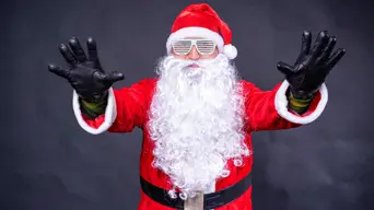 ‘Santa is fake’ posters upset families at Christmas parade ‘Santa is fake’ posters upset families at Christmas parade