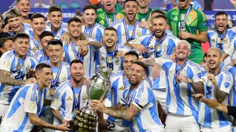 Scaloni hails Argentina for 'Triple Crown' triumph Scaloni hails Argentina for 'Triple Crown' triumph