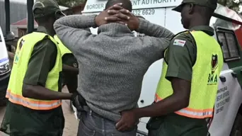 2 men netted for carrying fraudulently stamped Mozambican passports 2 men netted for carrying fraudulently stamped Mozambican passports