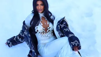 Renowned fashion designer Gert-Johan Coetzee Couture gown in the snow in between skiing Renowned fashion designer Gert-Johan Coetzee Couture gown in the snow in between skiing