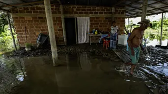 Life in water and mud: Colombians fed up with constant flooding Life in water and mud: Colombians fed up with constant flooding