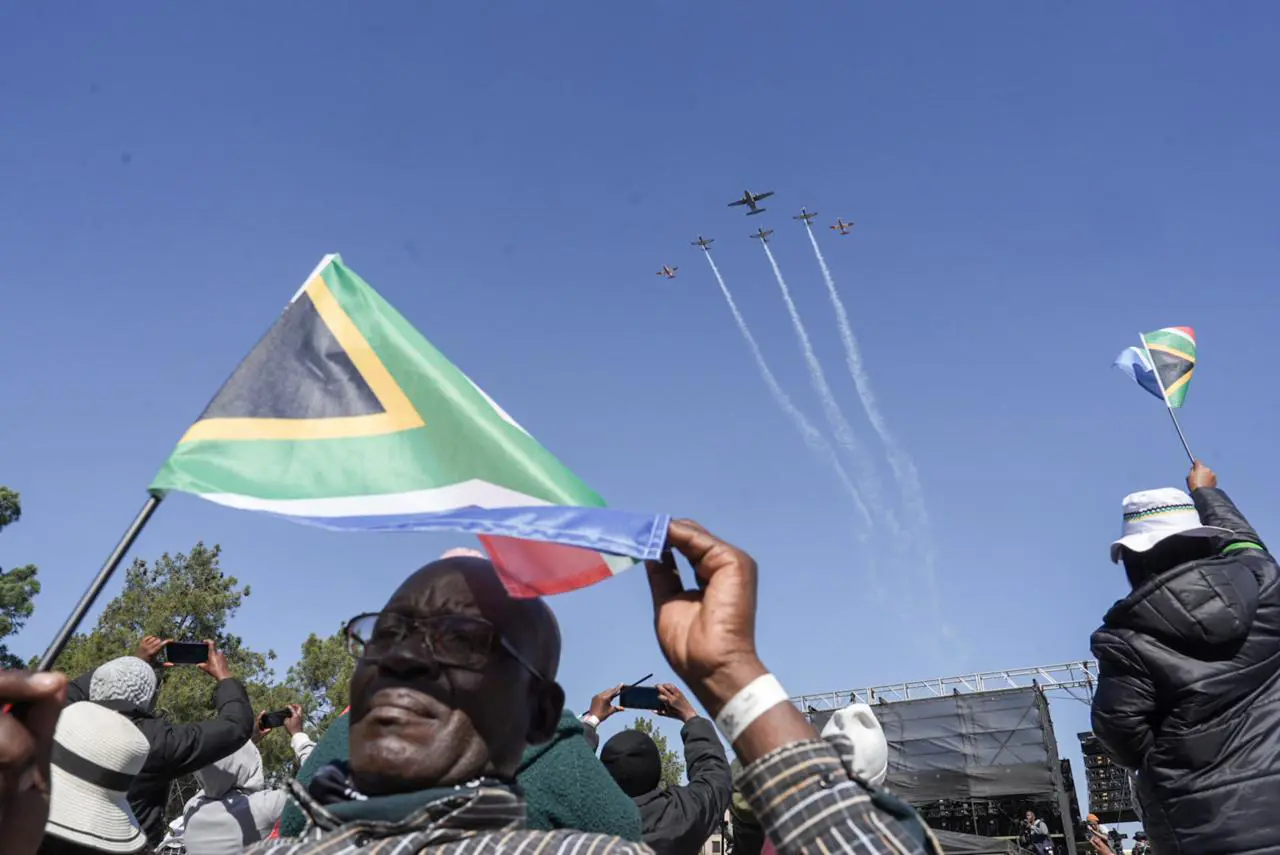 Spectators enjoy the South African Airforce's massed flypast during the inauguration of President Cyril Ramaphosa at the Union Buildings on 19 June 2024. Picture: Jacques Nelles/Eyewitness News Spectators enjoy the South African Airforce's massed flypast during the inauguration of President Cyril Ramaphosa at the Union Buildings on 19 June 2024. Picture: Jacques Nelles/Eyewitness News