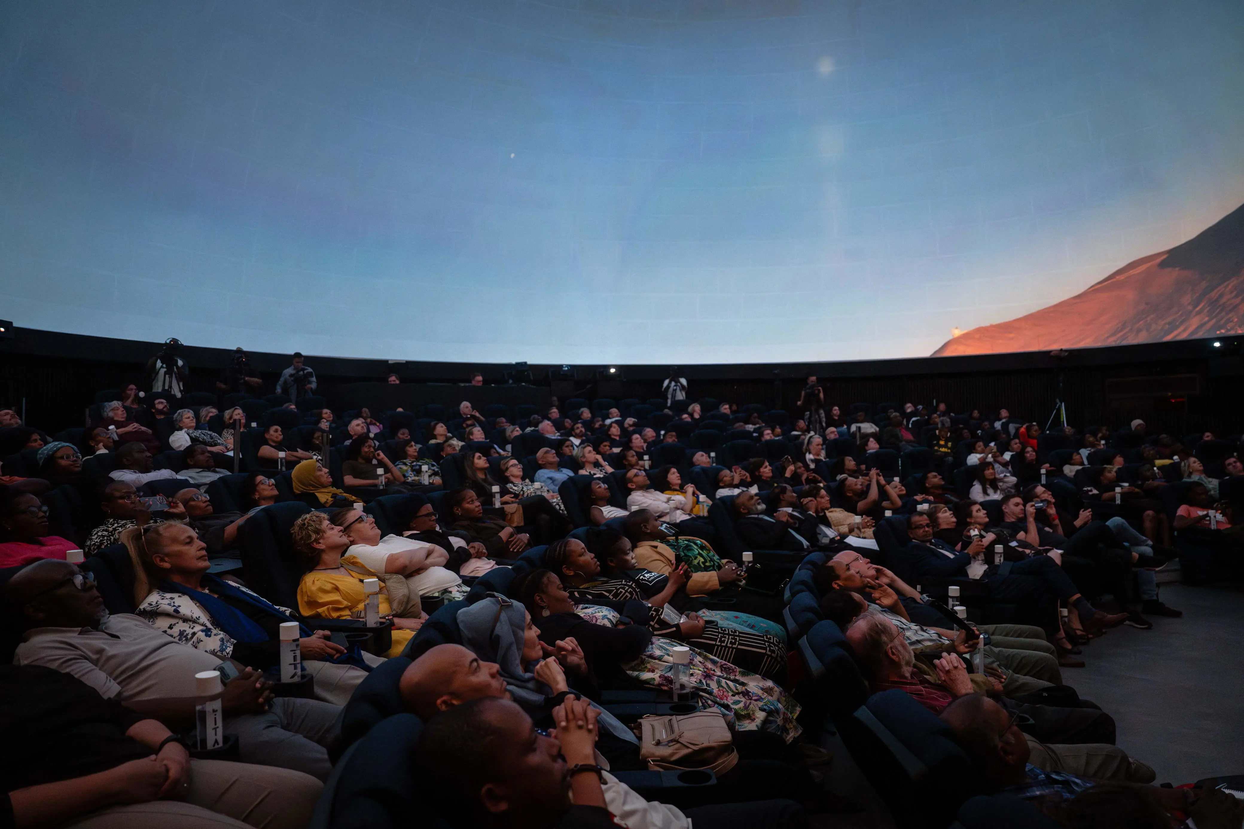 Guests watched short films at the launch of the largest digital dome in Africa at the University of Witwatersrand on 13 November 2024. Picture: Jacques Nelles/EWN Guests watched short films at the launch of the largest digital dome in Africa at the University of Witwatersrand on 13 November 2024. Picture: Jacques Nelles/EWN