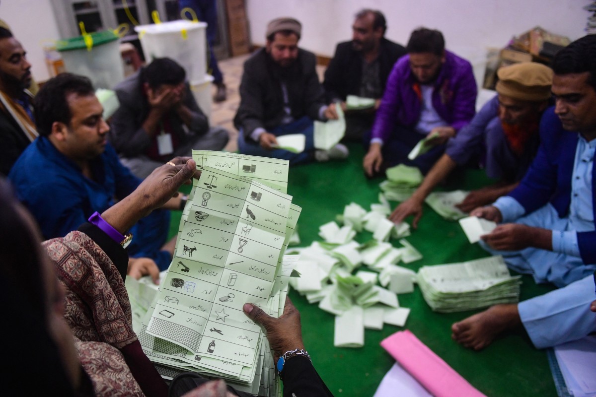 Polling staff start counting votes as polls end during country's national elections in Karachi, Pakistan on 8 February 2024. (Picture: AFP)