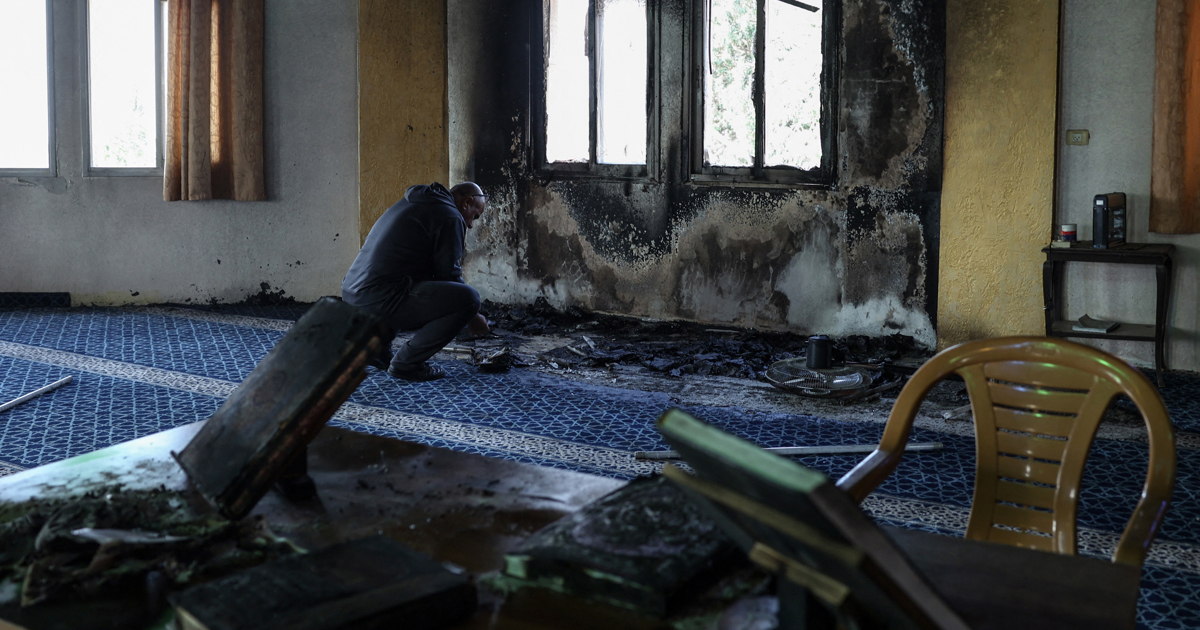 Israeli troops kill two West Bank Palestinians, settlers set mosque ablaze
