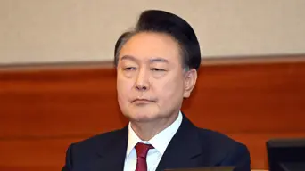 South Korea's Yoon resists questioning by lying down in underwear South Korea's Yoon resists questioning by lying down in underwear