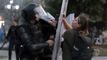 Clashes erupt in Mexico City anti-crime protests, injuring 120 Clashes erupt in Mexico City anti-crime protests, injuring 120