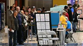 Harris or Trump? Long lines of voters in tense US election Harris or Trump? Long lines of voters in tense US election