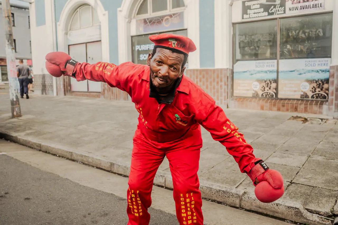 An EFF supporter outside the East London Magistrate's Court for Julius Malema's pre-sentencing hearing. Picture: Sphamandla Dlamini/EWN An EFF supporter outside the East London Magistrate's Court for Julius Malema's pre-sentencing hearing. Picture: Sphamandla Dlamini/EWN