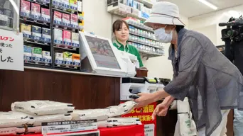 Japan rice prices double, raising pressure on PM Japan rice prices double, raising pressure on PM