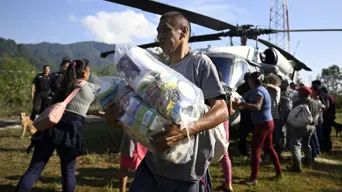 Mexican national Guard aids towns isolated by flood that killed 70 Mexican national Guard aids towns isolated by flood that killed 70