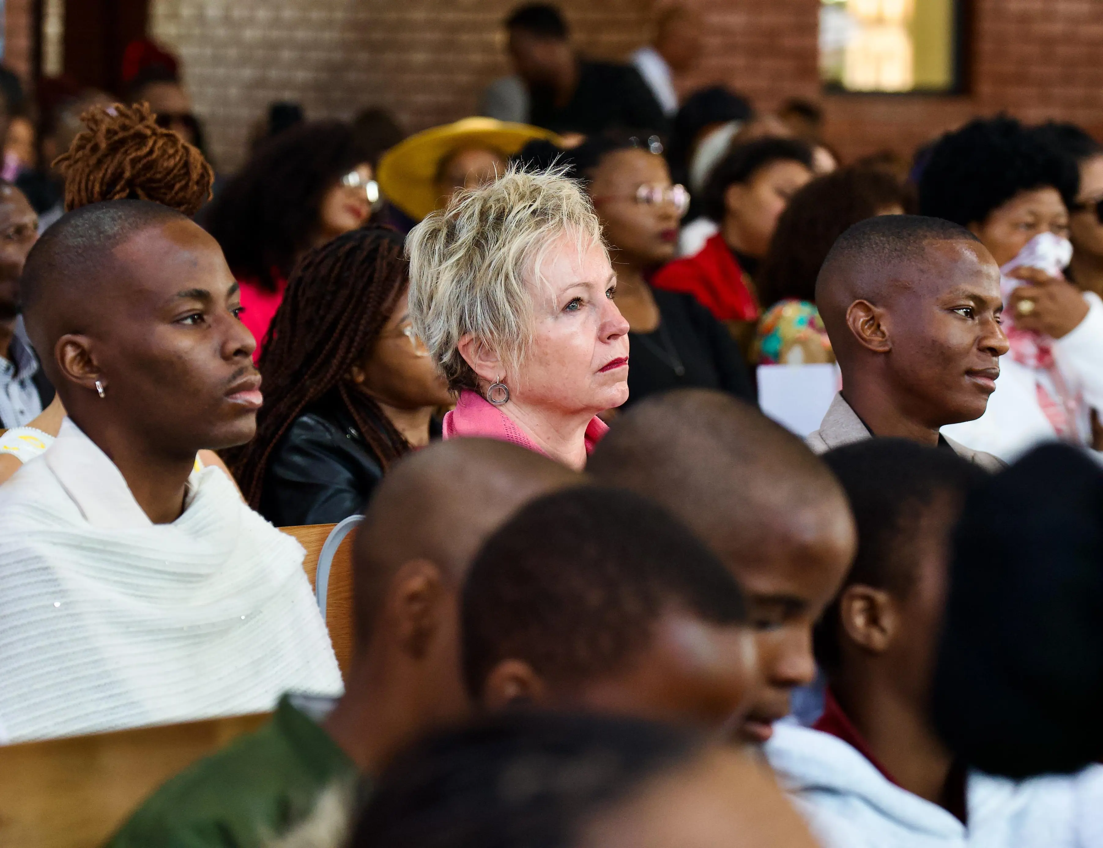 EWN reporter Mongezi Koko (left), news anchor Jane Dutton (middle) and EWN reporter Alpha Ramushwana (right) at the funeral service for Tshidi Madia at the San Salvador Catholic Church in Germiston, on 4 September. Picture: Katlego Jiyane/EWN EWN reporter Mongezi Koko (left), news anchor Jane Dutton (middle) and EWN reporter Alpha Ramushwana (right) at the funeral service for Tshidi Madia at the San Salvador Catholic Church in Germiston, on 4 September. Picture: Katlego Jiyane/EWN
