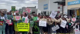 Massive protest outside KwaDukuza Court as Monswamy family murder suspects appear Massive protest outside KwaDukuza Court as Monswamy family murder suspects appear