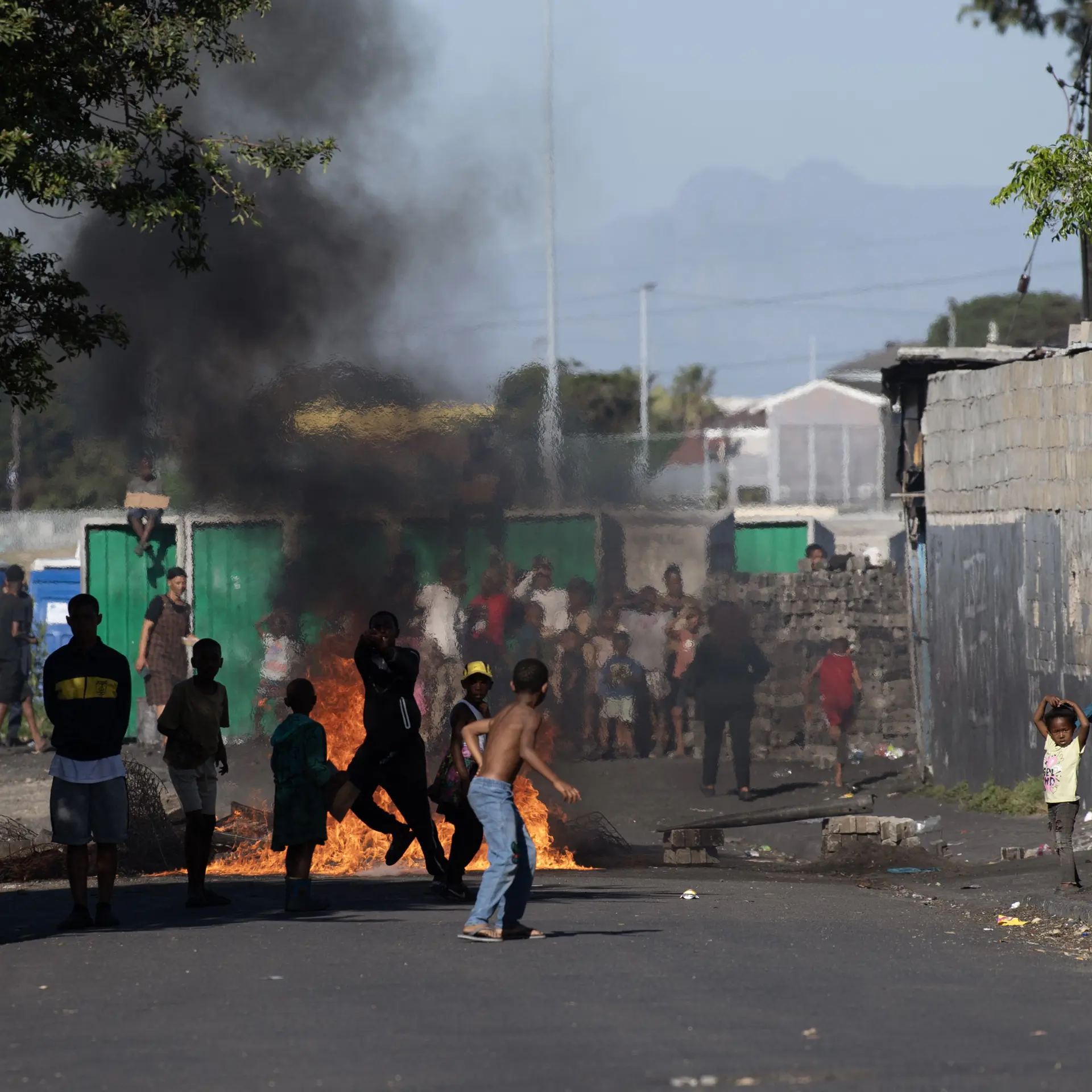 Residents of Die Vlei informal settlement protest against the presence of South Africa Police Service(SAPS) officers and supporters of People Against Gangsterism and Drugs (PAGAD) in Belgravia, in Cape Town, on October 11, 2026. Picture: AFP