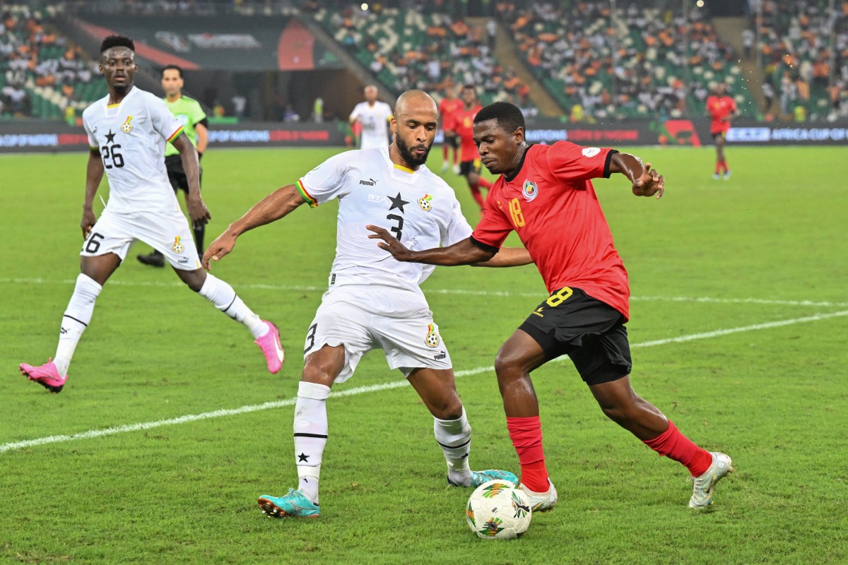 Ghana's defender Denis Odoi fights for the ball with Mozambique's forward #18 Gildo during the Africa Cup of Nations (CAN) 2024 group B football match between Mozambique and Ghana at Alassane Ouattara Olympic Stadium in Ebimpe, Abidjan on 22 January 2024. (Picture: AFP)