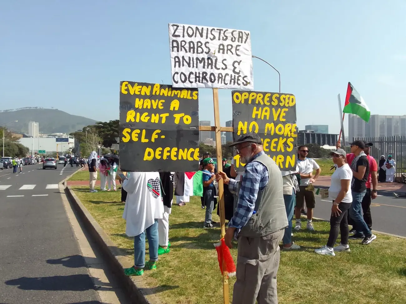 Protestors carried placards during their march to Parliament in Cape Town on 5 October 2024. Picture: Melikhaya Zagagana/Eyewitness News Protestors carried placards during their march to Parliament in Cape Town on 5 October 2024. Picture: Melikhaya Zagagana/Eyewitness News