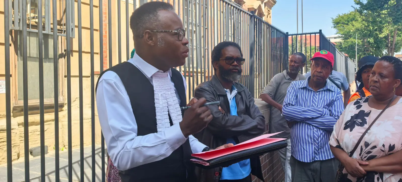 Tebogo Chauke from BP Mthombeni Attorneys and Family Spokesperson Mzwandile Soyaya outside the Germiston Magistrates court. 10 February 2026. Picture: Thandoluhle Ngcobo/EWN Tebogo Chauke from BP Mthombeni Attorneys and Family Spokesperson Mzwandile Soyaya outside the Germiston Magistrates court. 10 February 2026. Picture: Thandoluhle Ngcobo/EWN