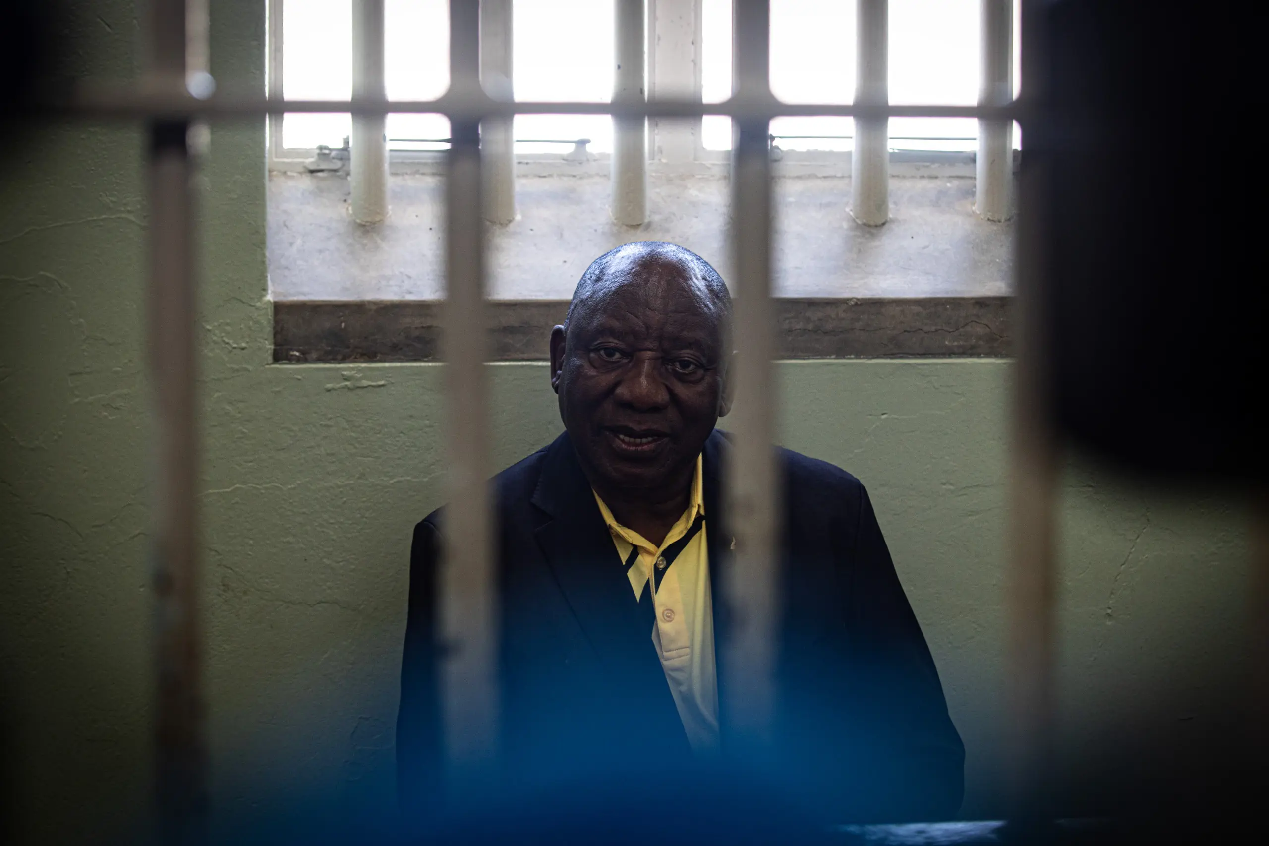 Ramaphosa sits in cell 913, where former President Nelson Mandela spent 18 years in prison on Robben Island. Picture: Kayleen Morgan/EWN Ramaphosa sits in cell 913, where former President Nelson Mandela spent 18 years in prison on Robben Island. Picture: Kayleen Morgan/EWN