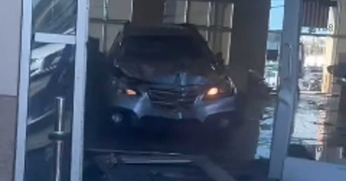 WATCH: Driver injures eight people after crashing into dealership ...