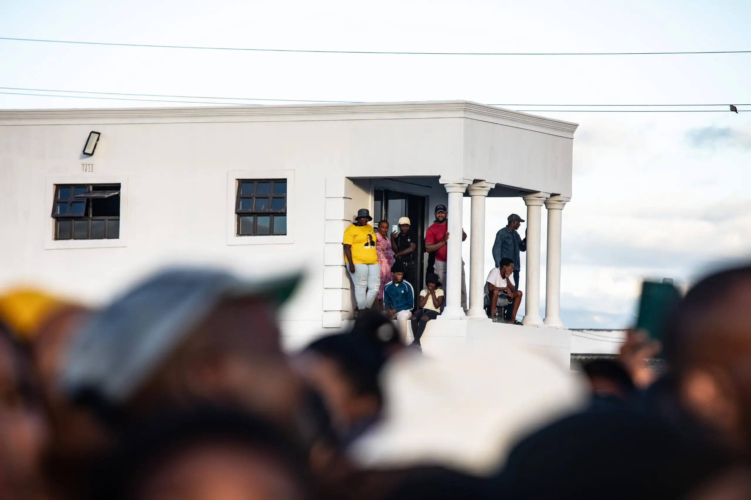 ANC supporters watch on in Delft. Picture: Kayleen Morgan/EWN ANC supporters watch on in Delft. Picture: Kayleen Morgan/EWN