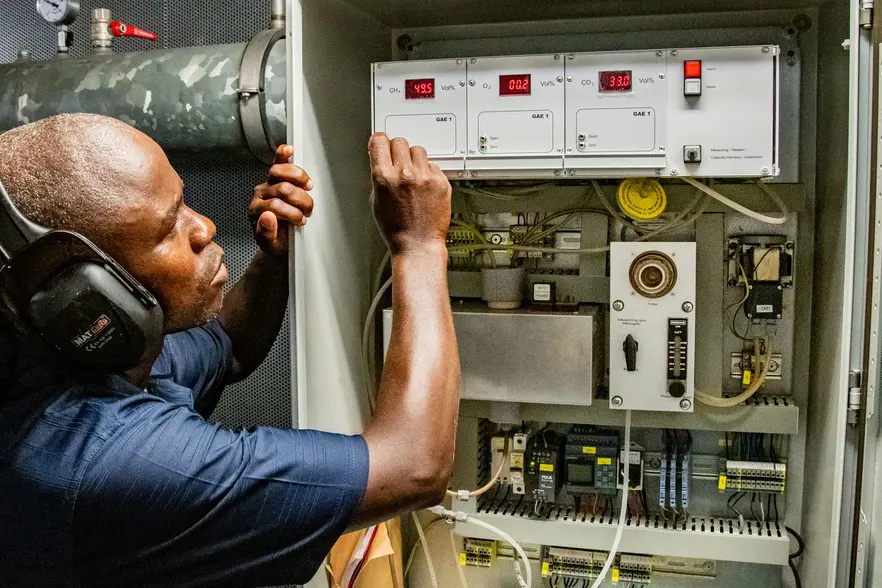 Maintenance contractor Andile Muleka does regular checks on the meters which measure and calibrate the flow of methane. Photos: Jeffrey Abrahams/Ground Up Maintenance contractor Andile Muleka does regular checks on the meters which measure and calibrate the flow of methane. Photos: Jeffrey Abrahams/Ground Up