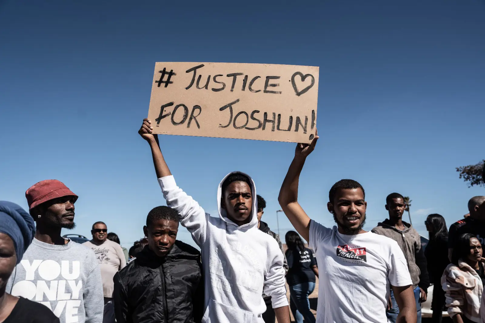 Saldanha residents protest outside the Vredenburg Magistrates Court after a brief appearance by Kelly Smith and four others. Photo: Kayleen Morgan/EWN Saldanha residents protest outside the Vredenburg Magistrates Court after a brief appearance by Kelly Smith and four others. Photo: Kayleen Morgan/EWN