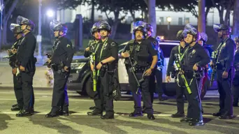 Police make 'mass arrests' in LA during nighttime curfew Police make 'mass arrests' in LA during nighttime curfew