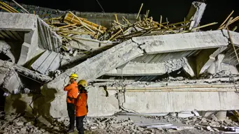 Rescuers search for 59 people trapped under collapsed Indonesian school Rescuers search for 59 people trapped under collapsed Indonesian school