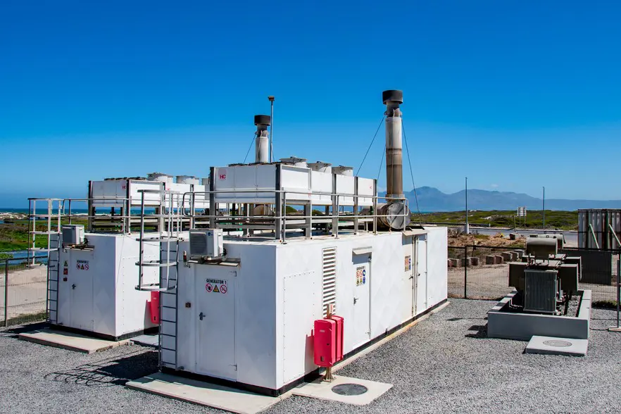 The two waste-to-energy generators which use recovered methane as fuel for the engines which drive the generators. On the right is the transformer from where the electricity is fed into the grid. Photos: Jeffrey Abrahams/Ground Up The two waste-to-energy generators which use recovered methane as fuel for the engines which drive the generators. On the right is the transformer from where the electricity is fed into the grid. Photos: Jeffrey Abrahams/Ground Up