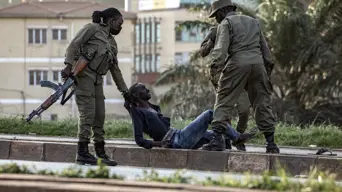 Uganda opposition MP tells AFP security forces kill 10 in his home Uganda opposition MP tells AFP security forces kill 10 in his home