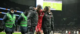 Liverpool sink nine-man Spurs but Isak limps off after rare goal Liverpool sink nine-man Spurs but Isak limps off after rare goal