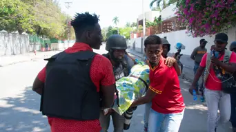 Over 50 killed in Haiti gang attacks, bodies 'devoured by dogs': rights group Over 50 killed in Haiti gang attacks, bodies 'devoured by dogs': rights group