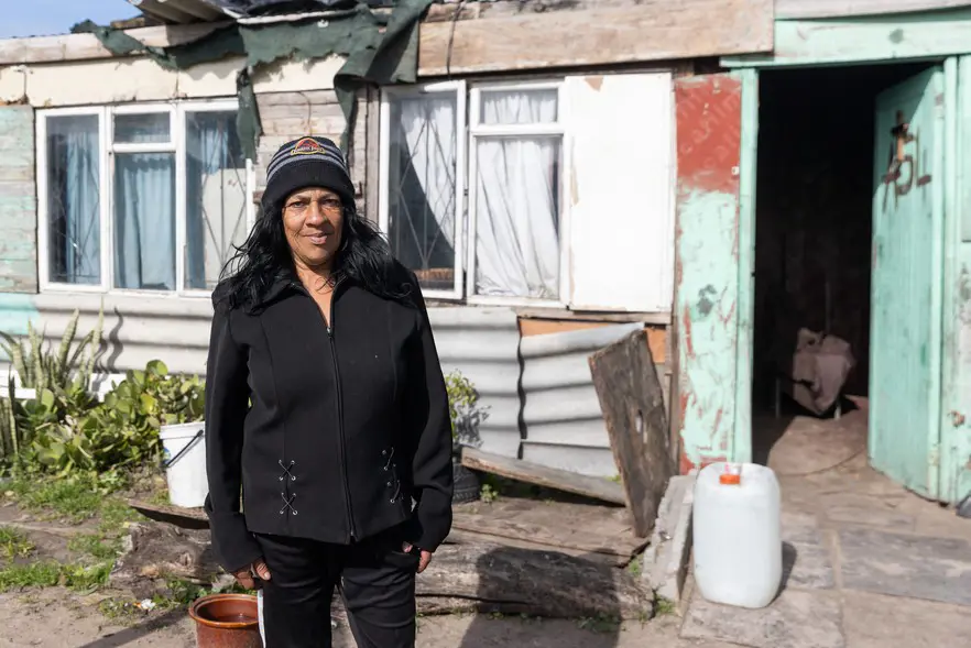 Resident Salome Oliver was concerned about the relocation of the farmers to where her house is currently erected. Picture: Ashraf Hendricks/GroundUp Resident Salome Oliver was concerned about the relocation of the farmers to where her house is currently erected. Picture: Ashraf Hendricks/GroundUp