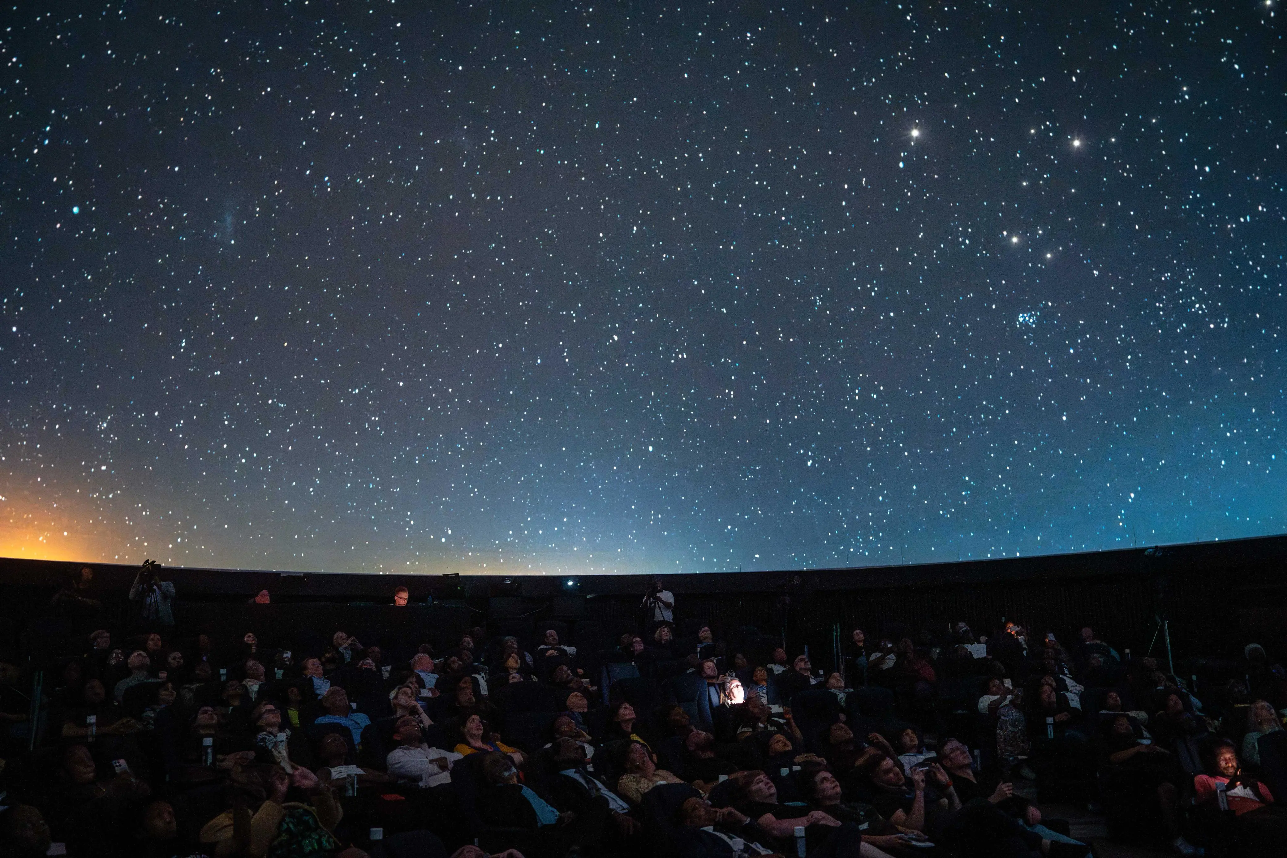 Guests star gaze at the launch of the largest digital dome in Africa at the University of Witwatersrand on 13 November 2024. Picture: Jacques Nelles/EWN Guests star gaze at the launch of the largest digital dome in Africa at the University of Witwatersrand on 13 November 2024. Picture: Jacques Nelles/EWN