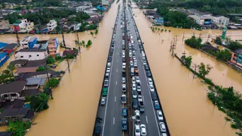 Thailand floods kill 13, leaving people stranded and roads submerged Thailand floods kill 13, leaving people stranded and roads submerged
