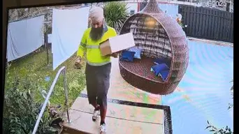 WATCH: Good Samaritan postman goes viral for taking washing off line during delivery in the rain WATCH: Good Samaritan postman goes viral for taking washing off line during delivery in the rain