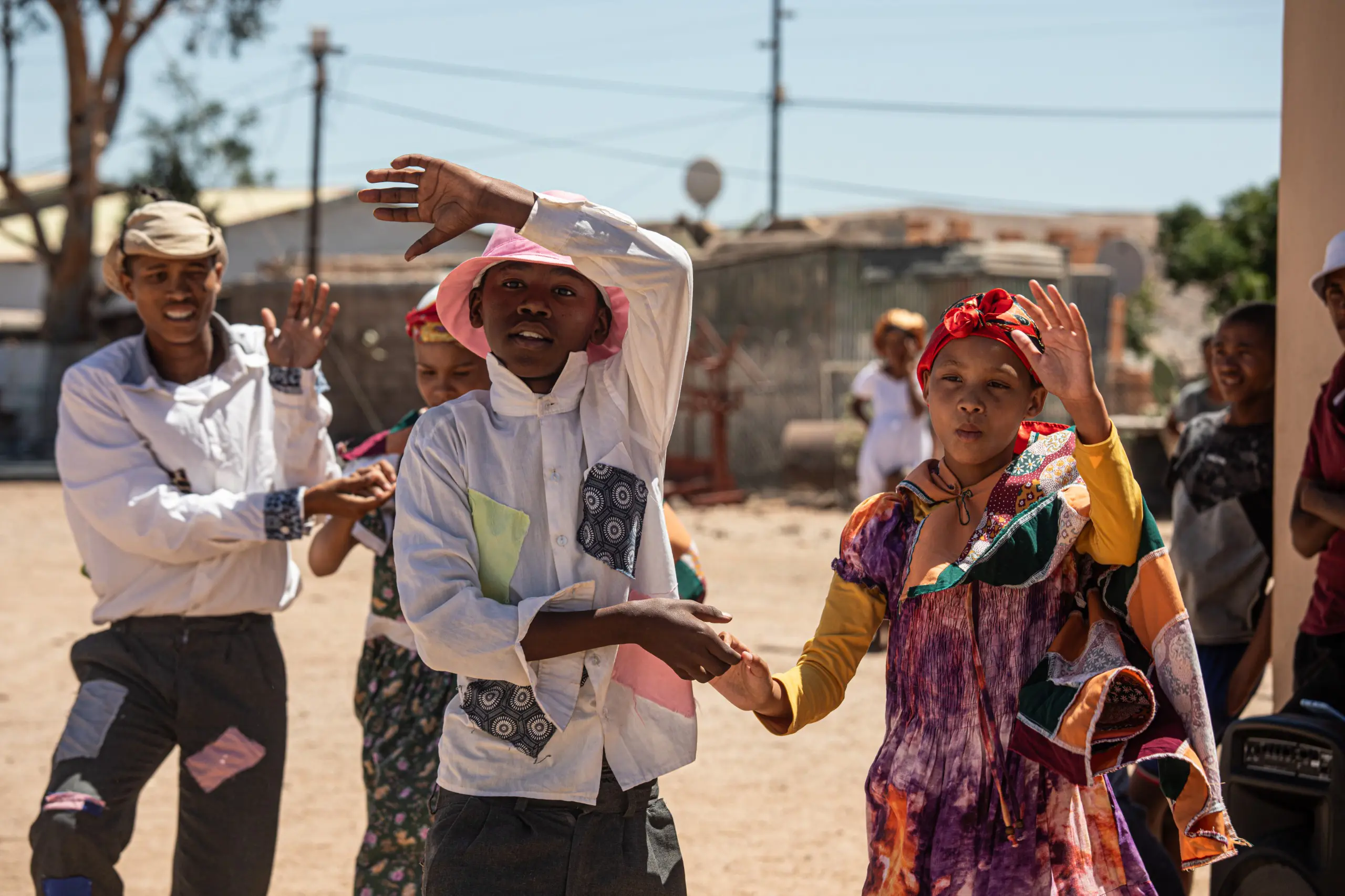 Young !Ama perform the NamaStap. The line dance is a traditional dance of the Rictersveld usually performed on sand. Picture: Kayleen Morgan/ Eyewitness News Young !Ama perform the NamaStap. The line dance is a traditional dance of the Rictersveld usually performed on sand. Picture: Kayleen Morgan/ Eyewitness News