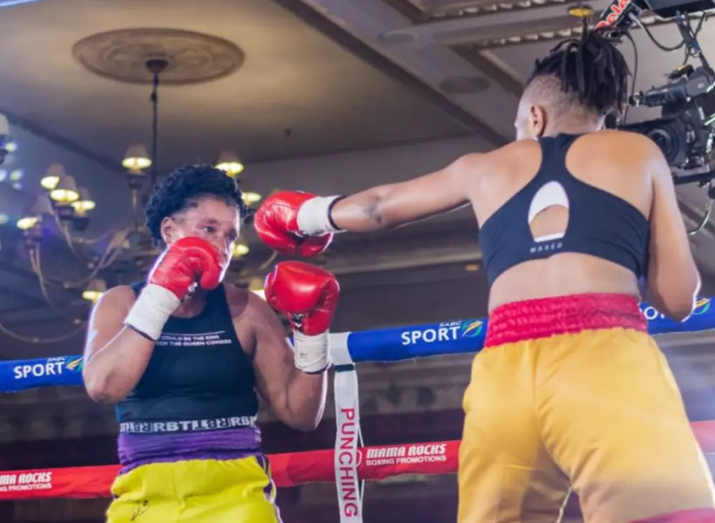 KwaZulu-Natal boxer Noxolo “Bumblebee” Mkhasibe (mustard and red shorts) throws a jab a during a fight. Picture: Supplied. KwaZulu-Natal boxer Noxolo “Bumblebee” Mkhasibe (mustard and red shorts) throws a jab a during a fight. Picture: Supplied.