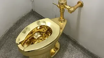 Solid gold toilet fetches R200m at auction Solid gold toilet fetches R200m at auction