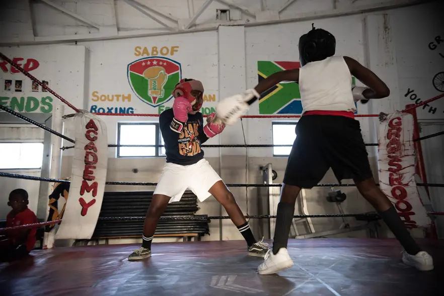 Two young boxers spar in the ring. Picture: David Harrison/@GroundUp News Two young boxers spar in the ring. Picture: David Harrison/@GroundUp News