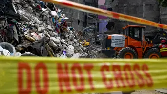 Death toll in Pakistan building collapse rises to 21 Death toll in Pakistan building collapse rises to 21