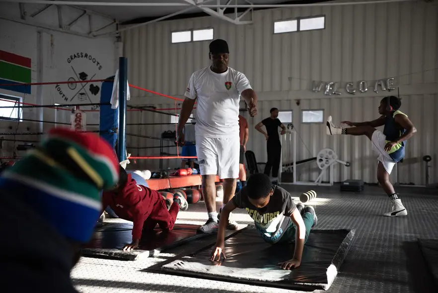 Warm-up session: Former professional boxer Jongi Kamko leads a basic fitness training session. Picture: David Harrison/@GroundUp News Warm-up session: Former professional boxer Jongi Kamko leads a basic fitness training session. Picture: David Harrison/@GroundUp News