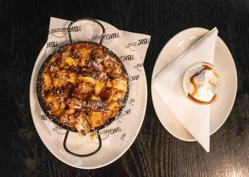 Generous portions mean most customers walk away full, with takeaway bags in tow. Picture: Jacques Nelles/Eyewitness News Generous portions mean most customers walk away full, with takeaway bags in tow. Picture: Jacques Nelles/Eyewitness News