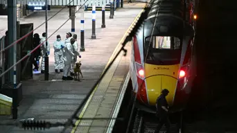 UK police probe mass train stabbing that wounded 10 UK police probe mass train stabbing that wounded 10