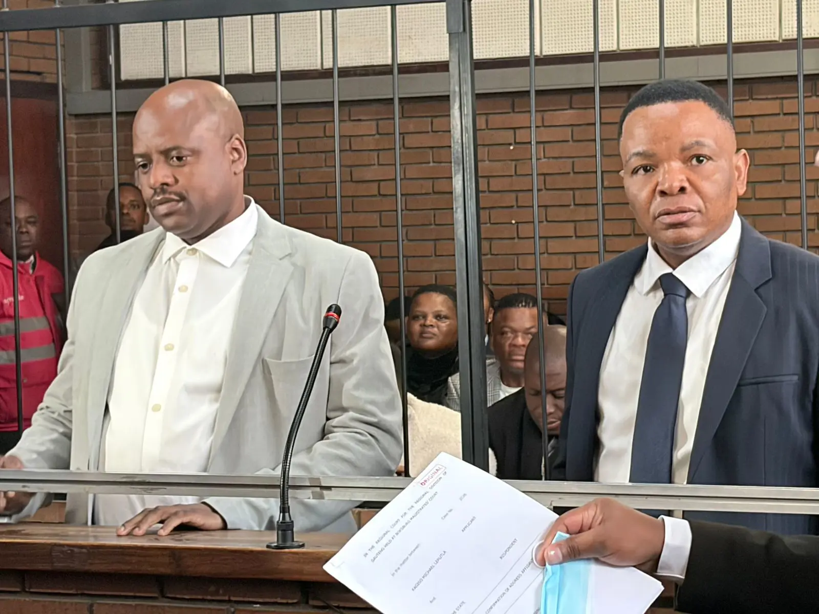 Julius Mkhwanazi and Kagiso Lerutla before the Boksburg Magistrates' Court for a bail application. Picture: Dimakatso Leshoro/EWN. Julius Mkhwanazi and Kagiso Lerutla before the Boksburg Magistrates' Court for a bail application. Picture: Dimakatso Leshoro/EWN.