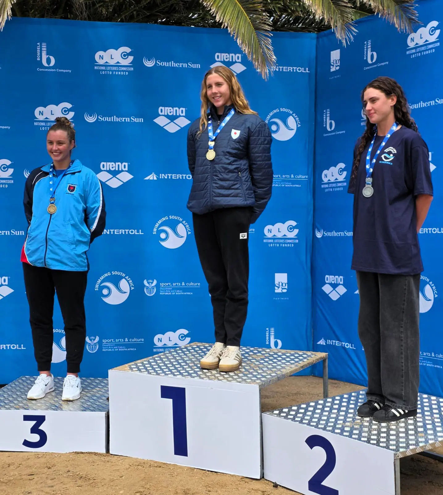 Women's 10km winners from left, Carli Antonopoulos (3rd), Callan Lotter (1st) and Hannah Neilson (2nd). Picture: Swimming SA Women's 10km winners from left, Carli Antonopoulos (3rd), Callan Lotter (1st) and Hannah Neilson (2nd). Picture: Swimming SA