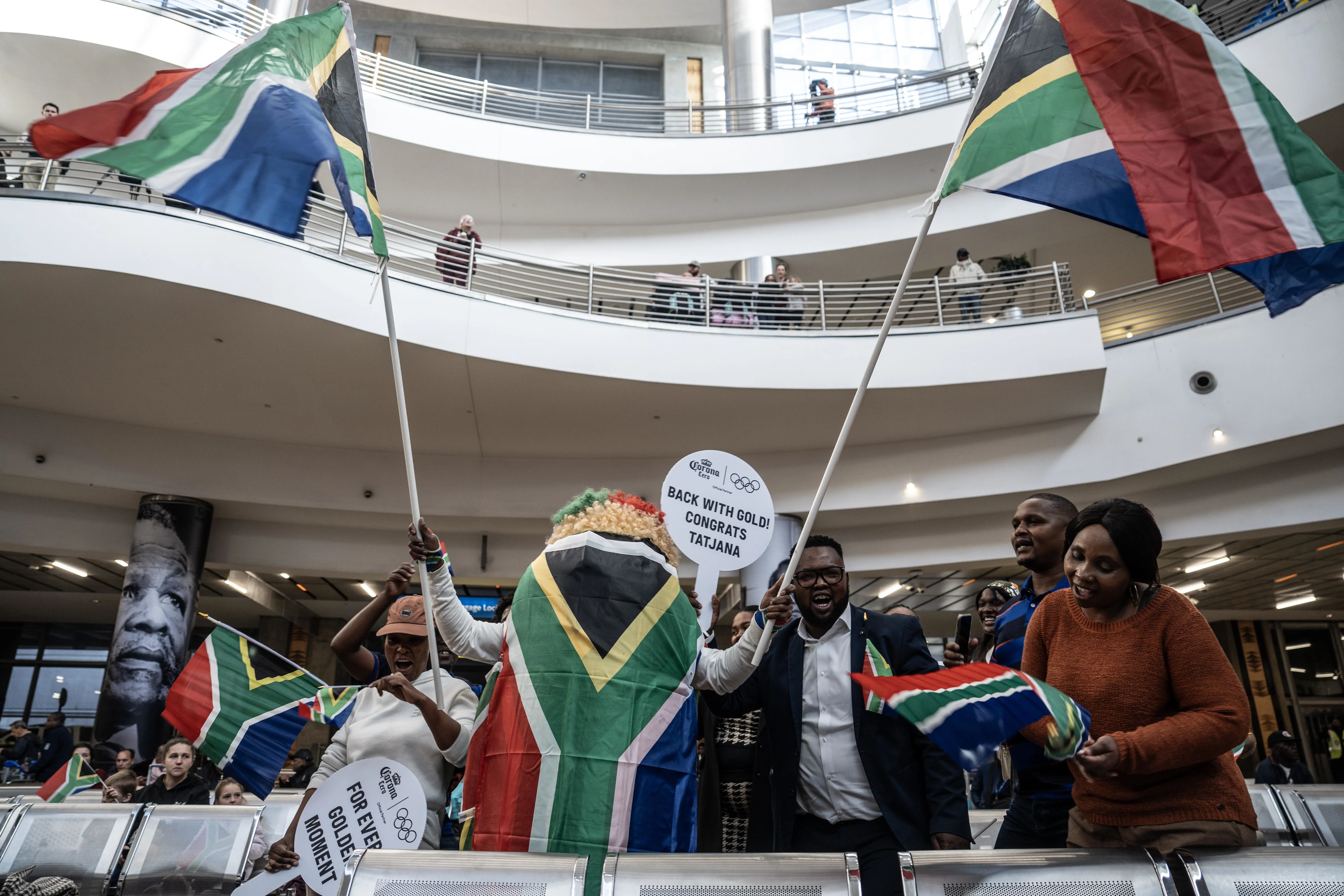 Fans waited for the arrival of Gold Olympic medallist Tatjana Smith and Silver Olympic medallists Bayanda Walaza and Bradley Nkoana at OR Tambo International Airport. Photo: Jacques Nelles/Eyewitness News Fans waited for the arrival of Gold Olympic medallist Tatjana Smith and Silver Olympic medallists Bayanda Walaza and Bradley Nkoana at OR Tambo International Airport. Photo: Jacques Nelles/Eyewitness News